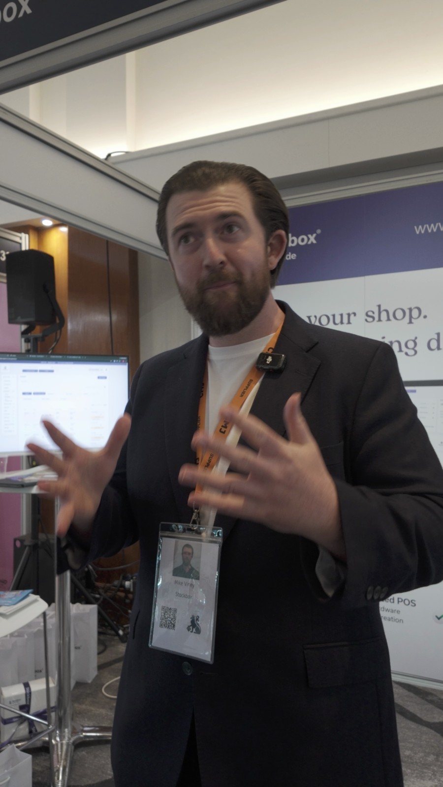Mike Viney speaking at the StockBox stand during his HIKOMORE interview at CMJ